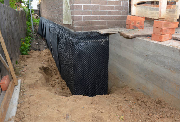 SJ Waterproofing Pros technician performing targeted Waterproofing assessment in Walhonding, OH